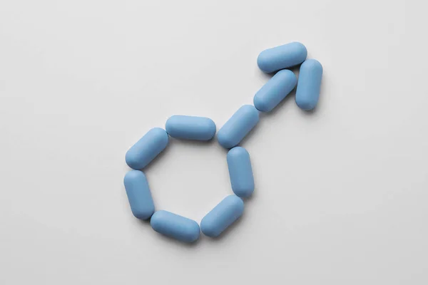 Man Teken Gemaakt Van Pillen Witte Achtergrond Bovenaanzicht Potentieprobleem — Stockfoto