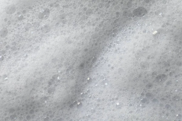 ふわふわの石鹸泡を背景として クローズアップビュー — ストック写真
