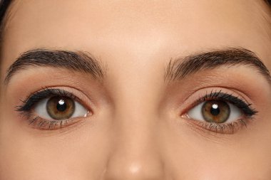 Young woman with permanent eyeliner makeup, closeup