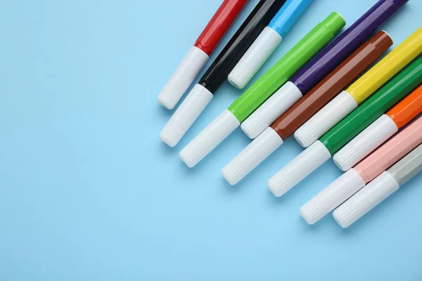 Many Different Colorful Markers Light Blue Background Flat Lay Space — Stock Photo, Image
