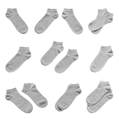 Beyaz arkaplanda gri çoraplarla ayarlandı