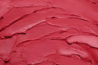 Arka plan olarak kırmızı ruj dokusu, üst görünüm