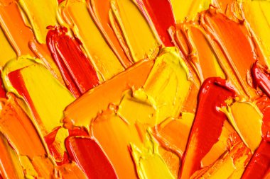 Beautiful strokes of colorful oil paints as background, closeup