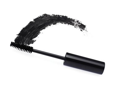 Uygulayıcı ve siyah rimel lekesi beyaz arkaplanda, üst görünümde