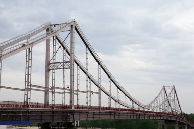 Beautiful view of modern bridge against cloudy sky