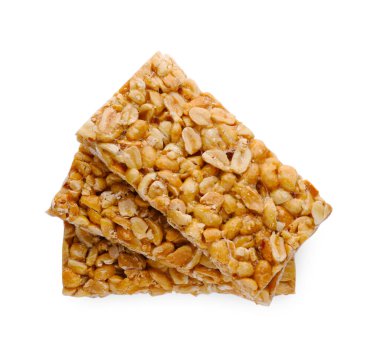 Lezzetli fıstık barları (kozinaki) beyaz, üst görünümde izole