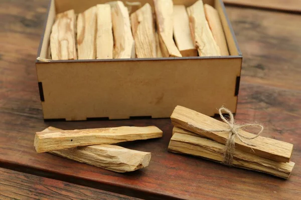 Palo Santo (holy wood) sticks on wooden table