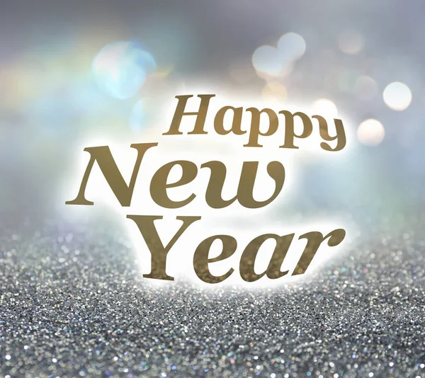 - Mutlu yıllar. Arka planda parlak parıltı ve bulanık ışıklar, bokeh etkisi