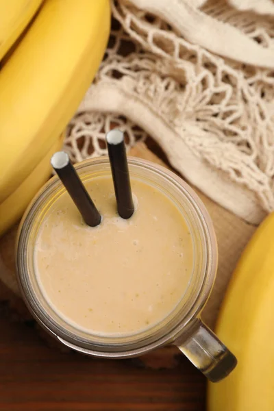 Einmachglas Mit Bananen Smoothie Auf Holztisch Flach Gelegt — Stockfoto