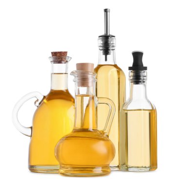 Beyaz arka planda farklı cam şişeler var.