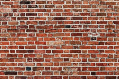 Arkaplan olarak kırmızı tuğlalardan yapılmış duvar
