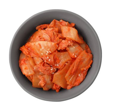 Bowl of spicy cabbage kimchi isolated on white, top view clipart