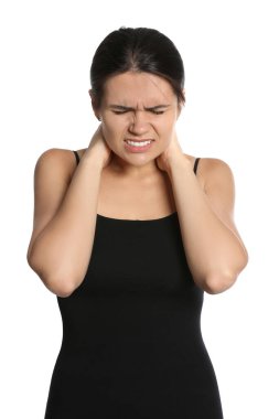 Young woman suffering from neck pain on white background clipart