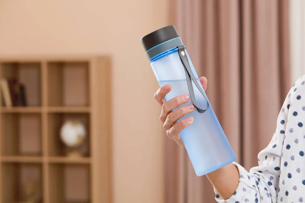 Woman Bottle Water Room Closeup Space Text — Stockfoto