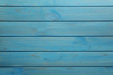 Açık mavi ahşap yüzey dokusu arka plan olarak, üst görünüm