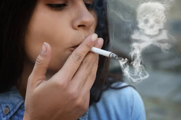 No Smoking. Woman with cigarette outdoors, closeup. Skull and crossbones symbol of smoke