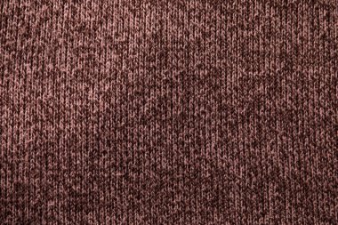 Arka planda iplik olan örülmüş kumaş, üst manzara. Kumaş traşı kullanmadan önce