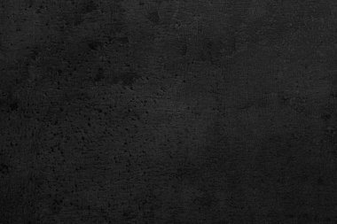 Arkaplan olarak siyah taş yüzeyinin dokusu, yakın plan