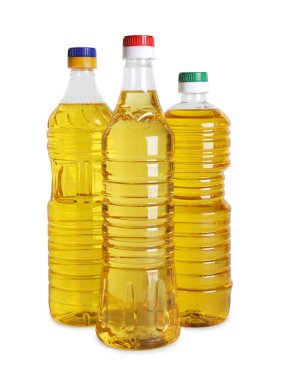 Beyaz arka planda bir şişe yağ.