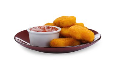 Beyaz üzerine ketçap serpiştirilmiş lezzetli tavuk nuggetları.