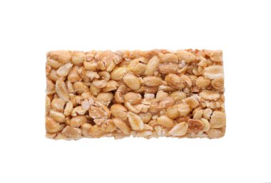 Lezzetli fıstık çubuğu (kozinaki) beyaz, üst görünümde izole