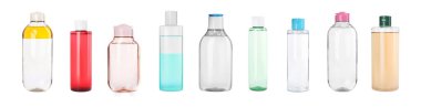 Set with bottles of micellar cleansing water on white background