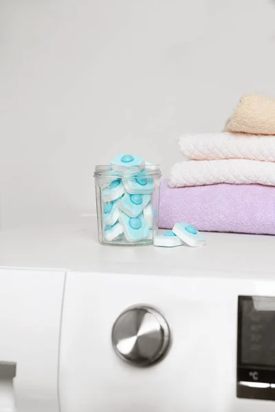 Jar Water Softener Tablets Stacked Towels Washing Machine — Stock Photo, Image
