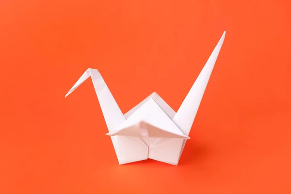 Origami Kunst Handgemaakte Papieren Kraan Oranje Achtergrond Close — Stockfoto