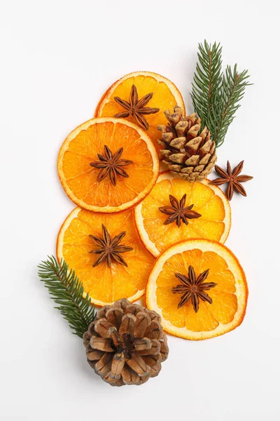Dry Orange Slices Anise Stars Fir Branches Cones White Background — Fotografia de Stock
