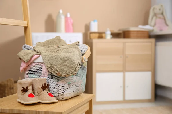 Laundry Basket Baby Clothes Shoes Wooden Chair Indoors Space Text — 스톡 사진