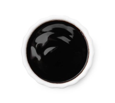 Bowl with balsamic glaze isolated on white, top view