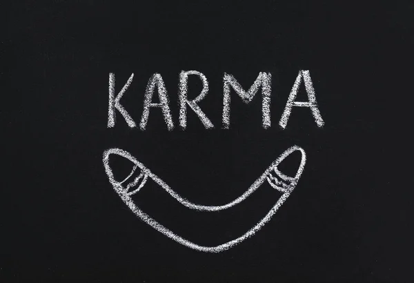 Drawn Boomerang Word Karma Written Blackboard — Stock Photo, Image