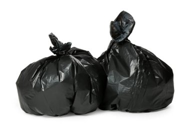 Trash bags full of garbage isolated on white