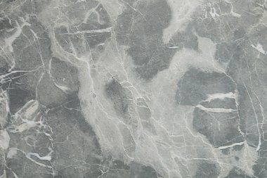 Arkaplan olarak gri mermer yüzeyin dokusu, yakın plan