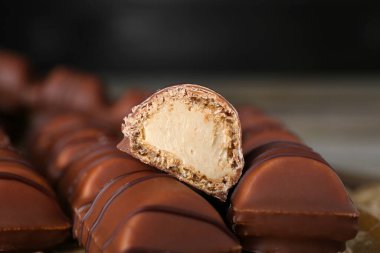 Many tasty chocolate bars, closeup. Delicious snack