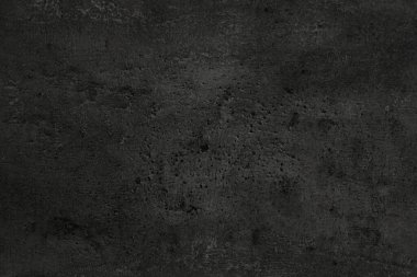 Arkaplan olarak siyah taş yüzeyinin dokusu, yakın plan