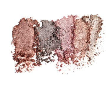 Crushed eye shadows on white background, top view. Professional makeup product