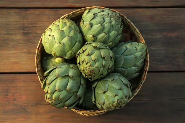 Tasty Fresh Raw Artichokes Wooden Table Top View — Stock Photo, Image