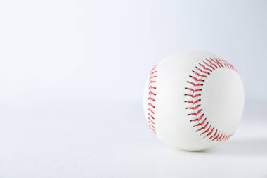 Baseball ball on white background, closeup with space for text. Sports game
