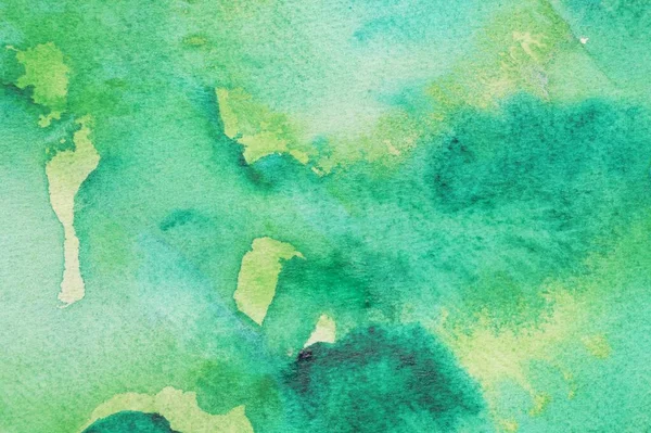 Abstract green watercolor painting as background, top view