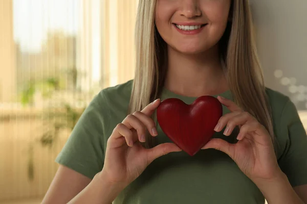 Happy Volunteer Holding Red Heart Hands Indoors Closeup — Stockfoto