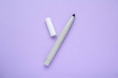 Grey marker on light background, flat lay