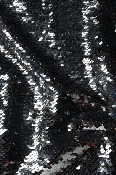 Arkaplan olarak güzel parlak pulların dokusu, yakın plan