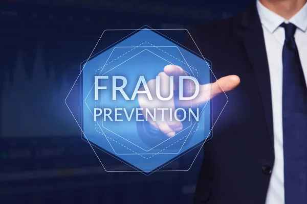 Fraud prevention. Man using digital screen, closeup, Graphs and data on blue background