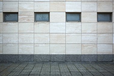 View on urban tiled wall and pavement