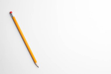 Sharp graphite pencil with eraser on white background, top view. Space for text