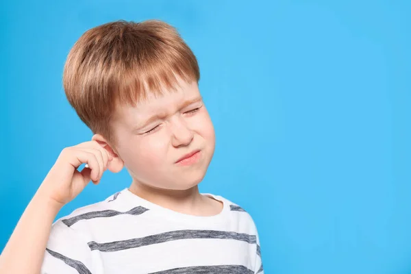 Little Boy Cleaning Ear Cotton Swab Light Blue Background Space — 图库照片
