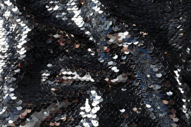 Arkaplan olarak güzel parlak pulların dokusu, yakın plan