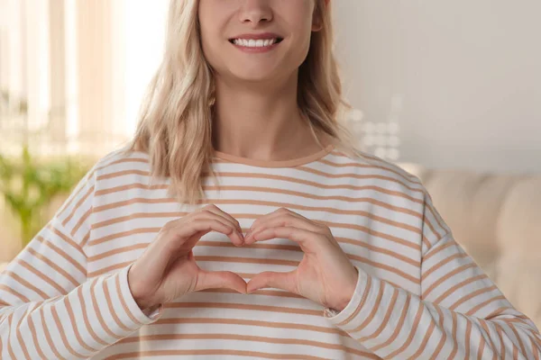Happy Volunteer Making Heart Her Hands Room Closeup — Stockfoto