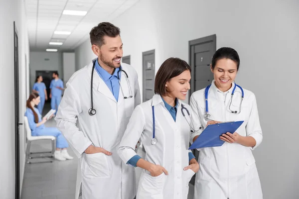 Team of medical students in college hallway